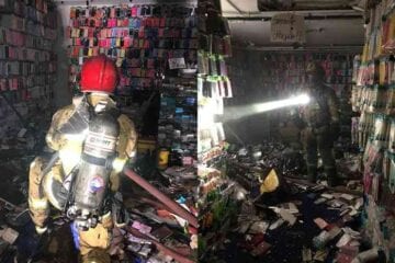 Bombeiros combatem incêndio em shopping popular de BH