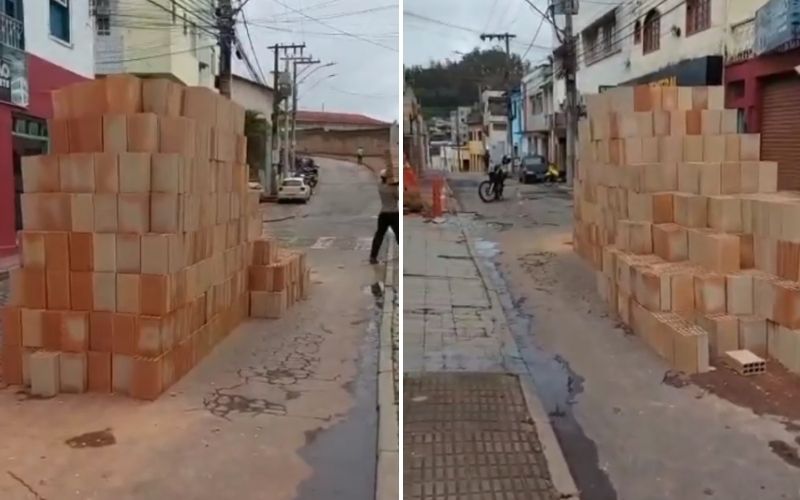 Empresa descarrega tijolos no meio da rua no centro de Itabira