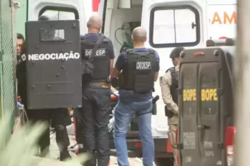 Após ser baleado, homem que fez criança refém respira por aparelhos