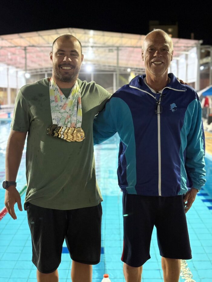 Arthur Rossi e seu treinador José Lino.